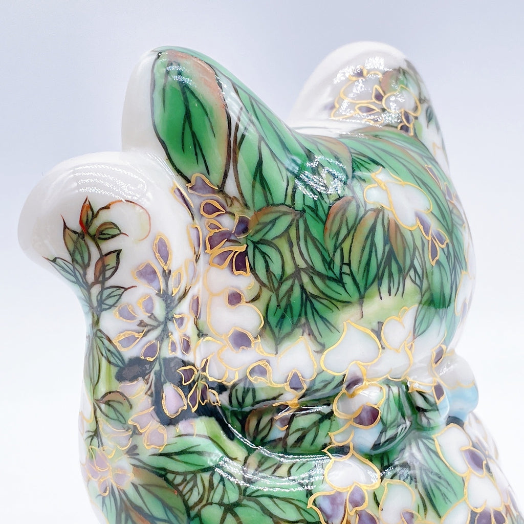 Japanese Kiyomizu-style lucky cat with black and white wisteria vines