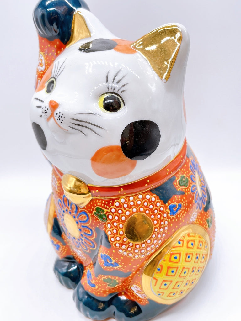 Japanese Kutani-style lucky cat with white hair
