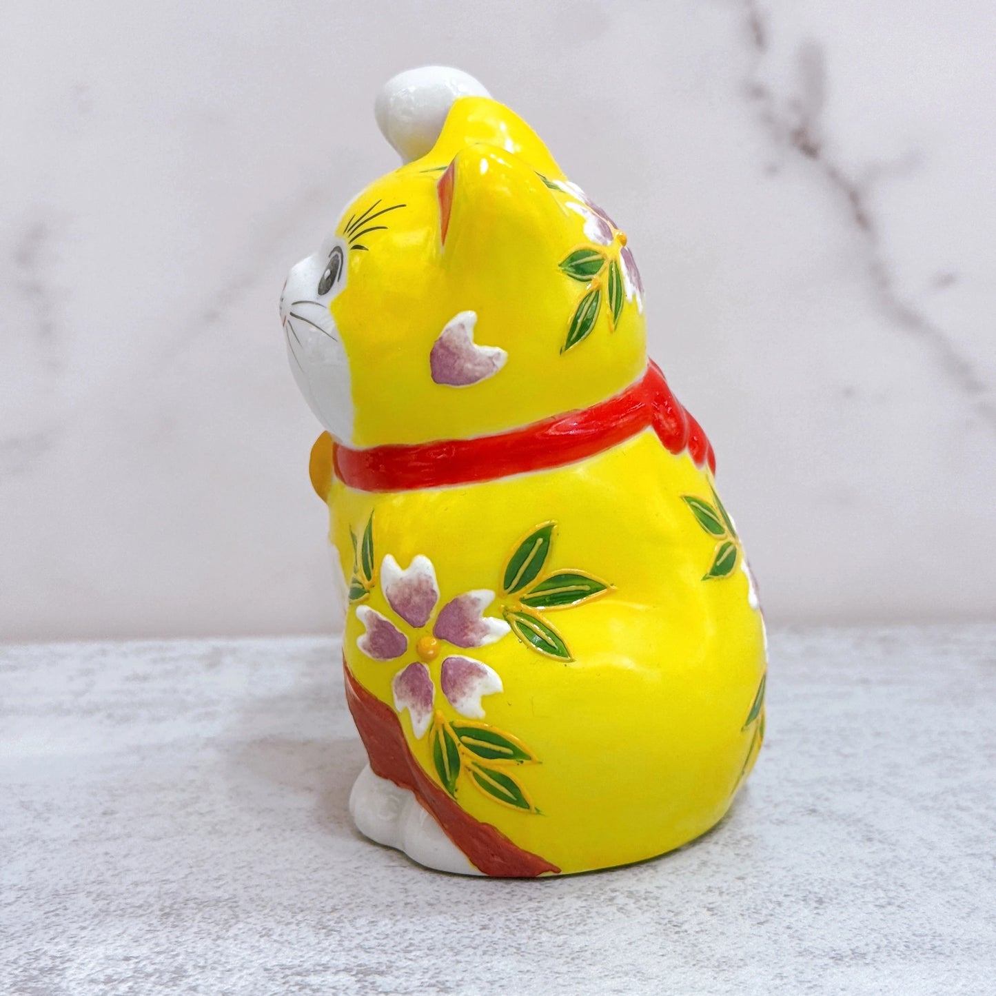 Japanese Kutani-yaki lucky cat with yellow background and purple Fuji cherry blossoms, No. 3.8