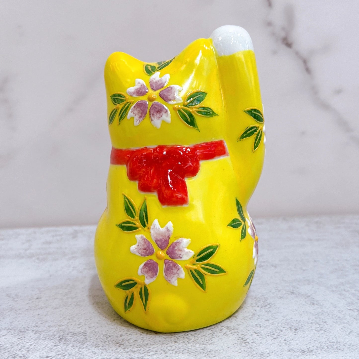 Japanese Kutani-yaki lucky cat with yellow background and purple Fuji cherry blossoms, No. 3.8