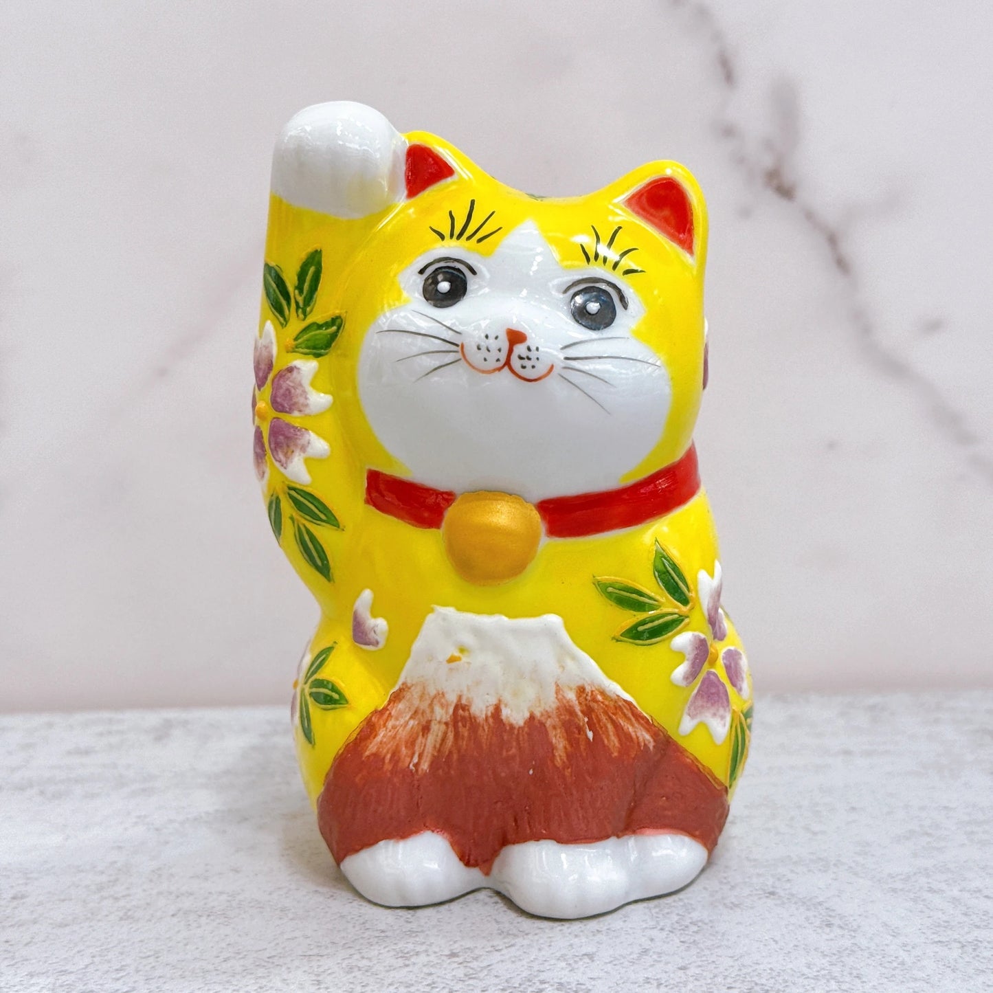 Japanese Kutani-yaki lucky cat with yellow background and purple Fuji cherry blossoms, No. 3.8