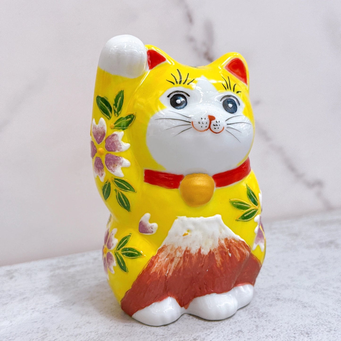 Japanese Kutani-yaki lucky cat with yellow background and purple Fuji cherry blossoms, No. 3.8