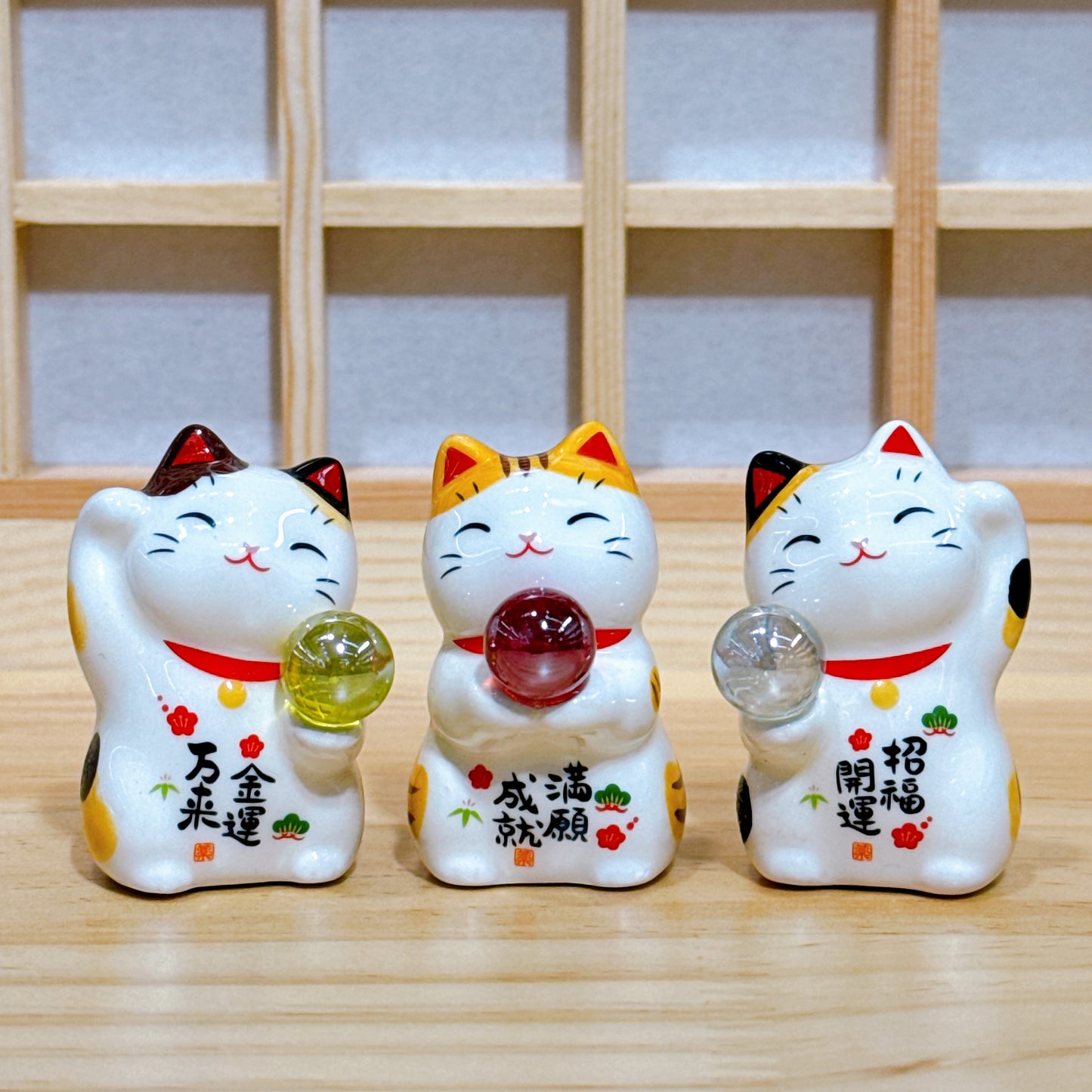 Japanese lucky cat (jade) bringing good fortune and fulfillment of wishes. 