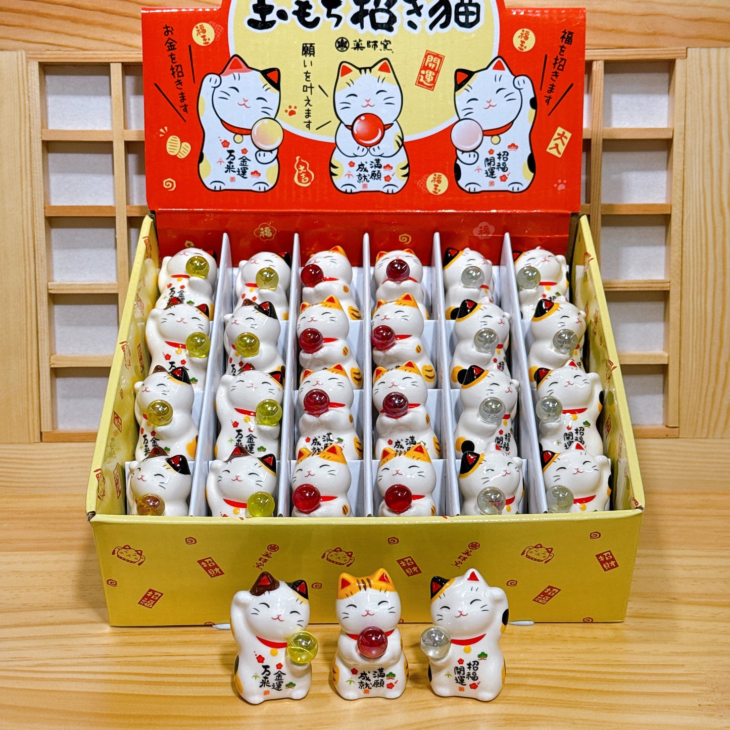 Japanese lucky cat (jade) bringing good fortune and fulfillment of wishes. 