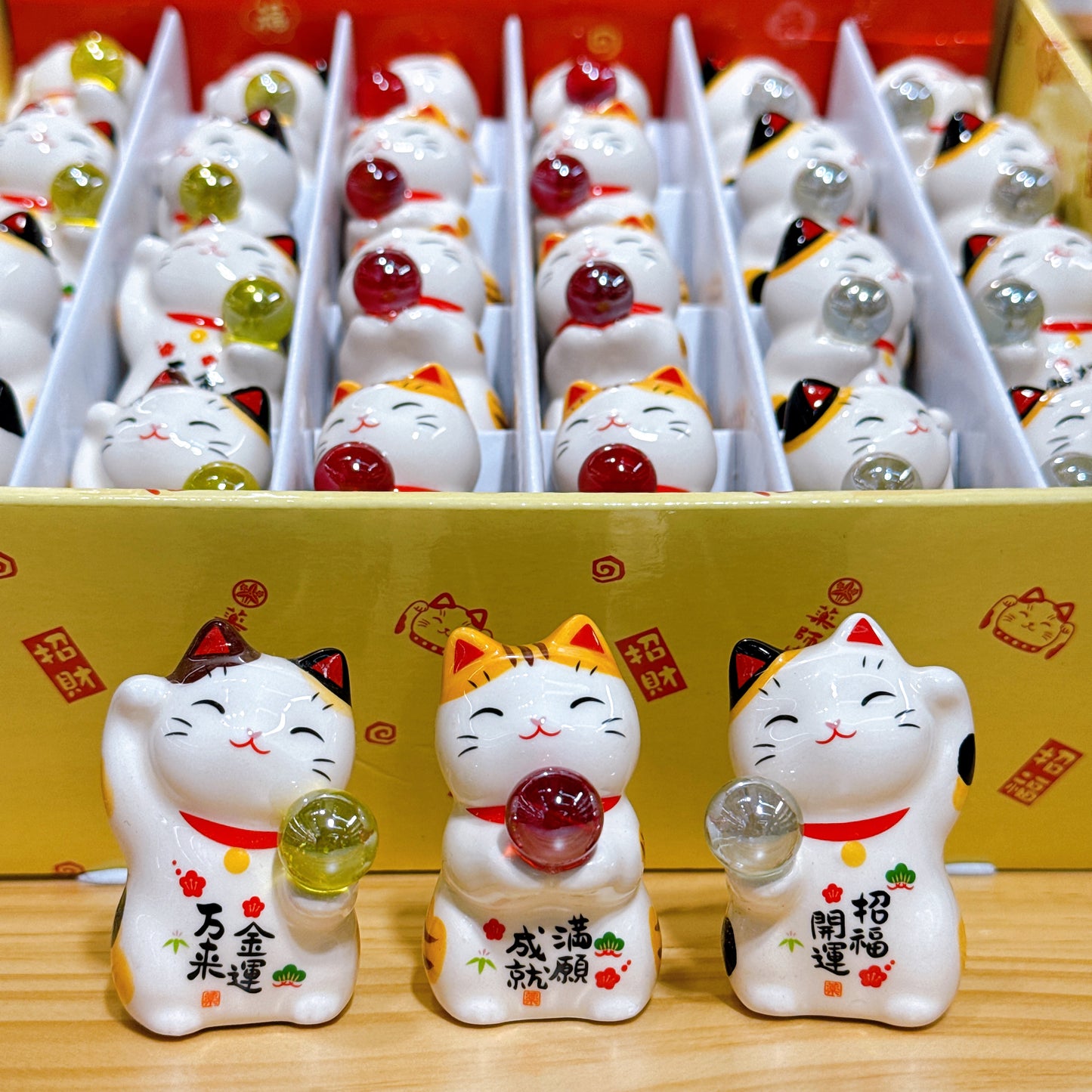 Japanese lucky cat (jade) bringing good fortune and fulfillment of wishes. 