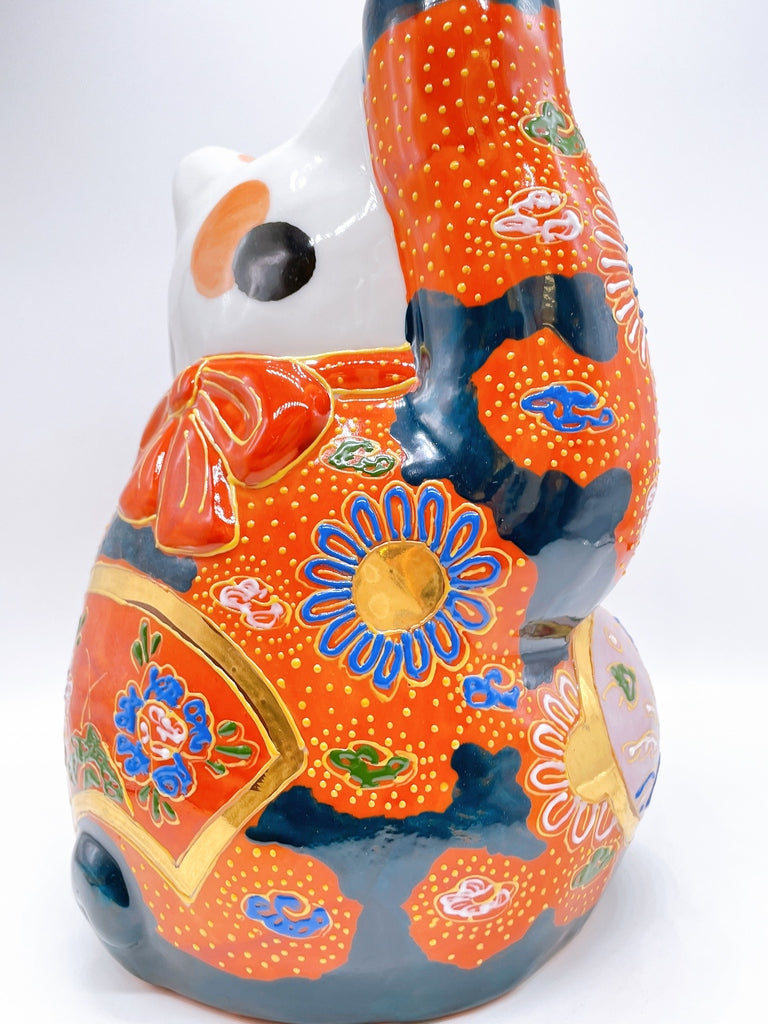 Japanese Kutani-style lucky cat with white hair
