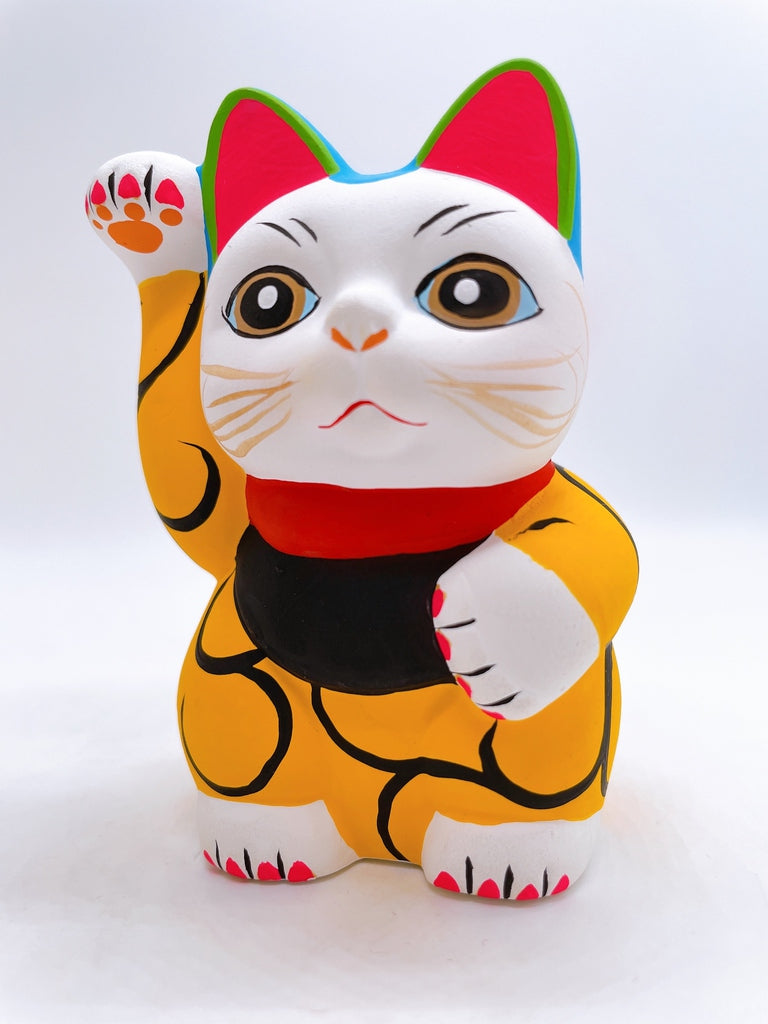 Japanese arabesque yellow lucky cat with a million taels of silver