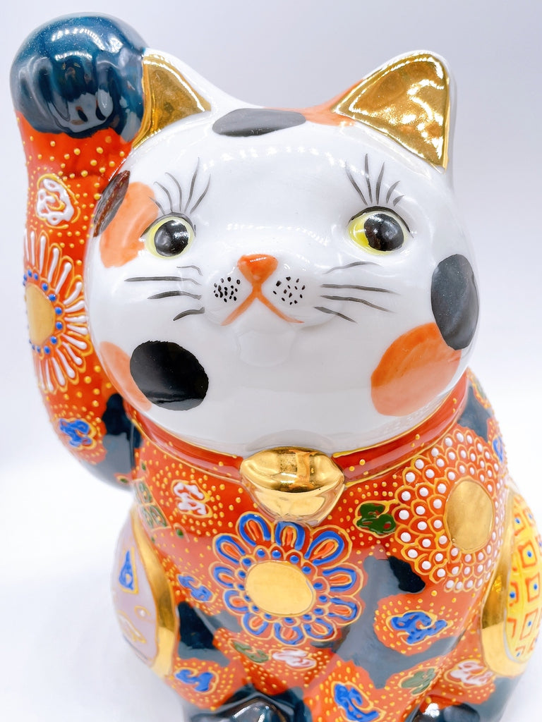 Japanese Kutani-style lucky cat with white hair