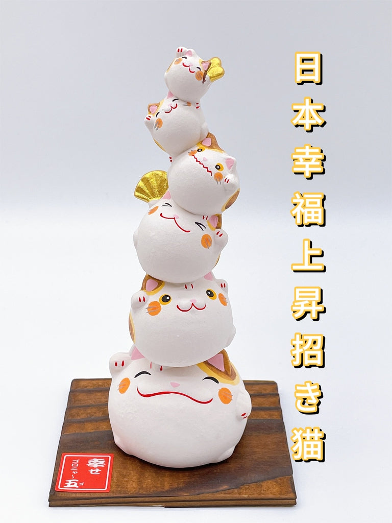 Japanese lucky cat symbolizing happiness.