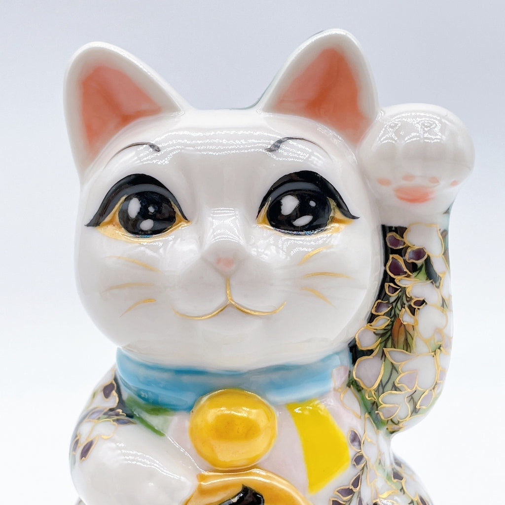 Japanese Kiyomizu-style lucky cat with black and white wisteria vines