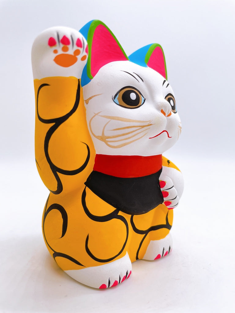 Japanese arabesque yellow lucky cat with a million taels of silver