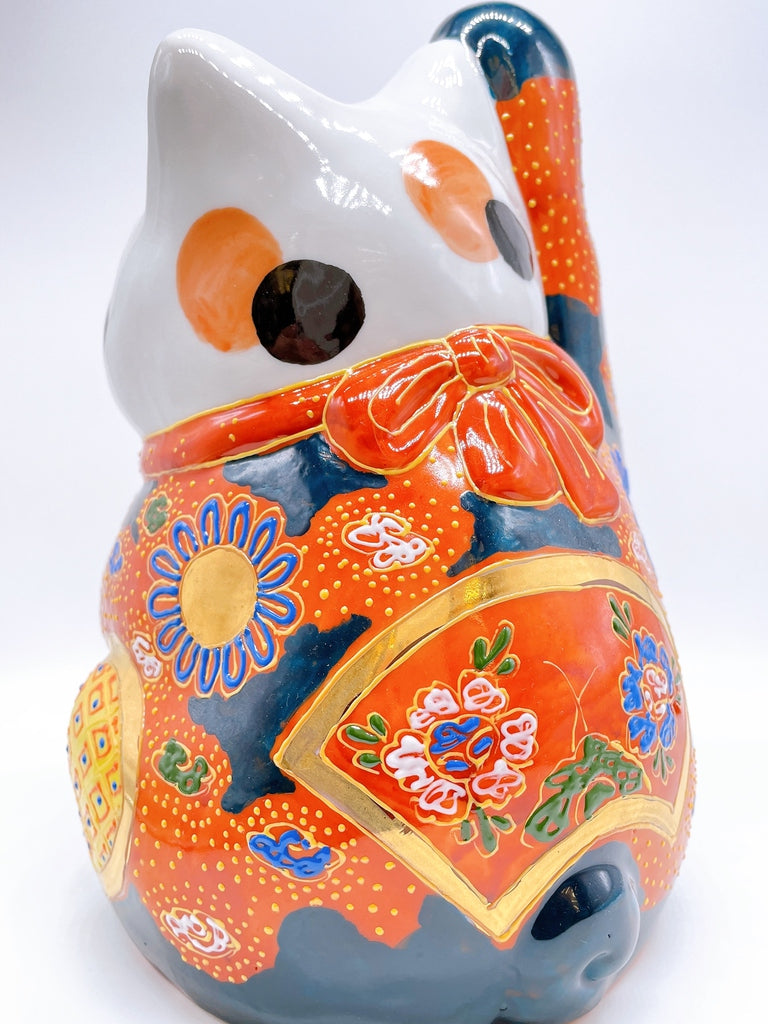 Japanese Kutani-style lucky cat with white hair