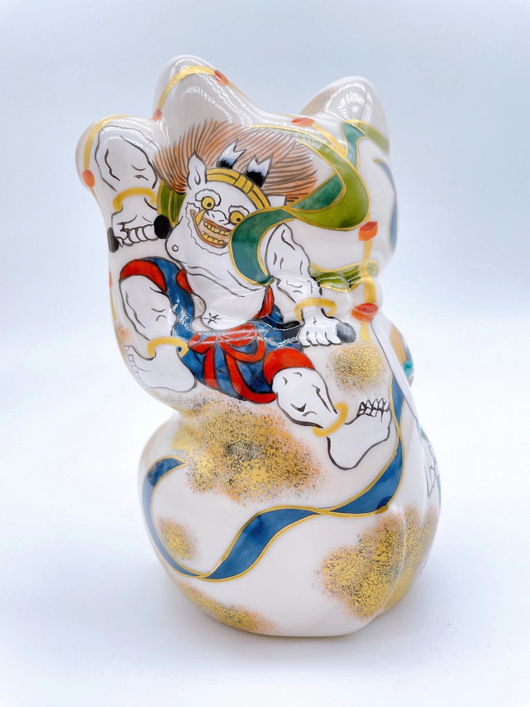 Japanese Kiyomizu-yaki lucky cat image with wind and thunder gods.