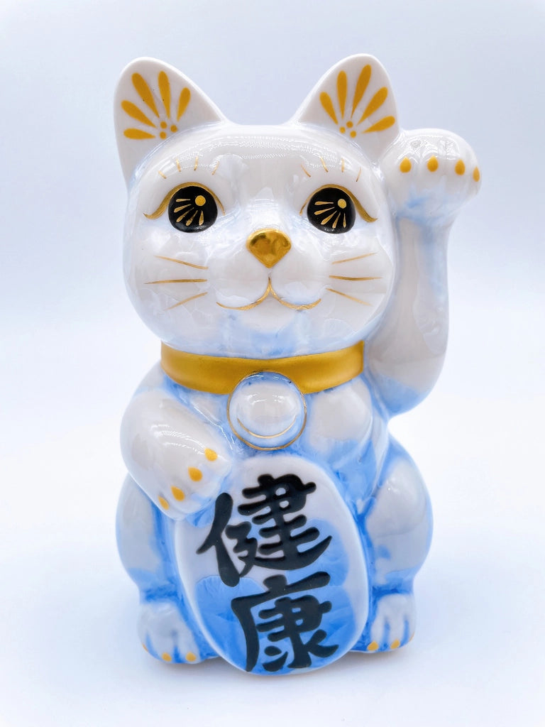 Japanese Kiyomizu-yaki lucky cat flower crystals, white and blue.