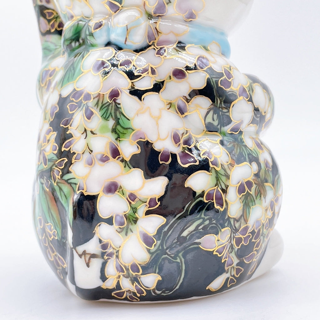 Japanese Kiyomizu-style lucky cat with black and white wisteria vines