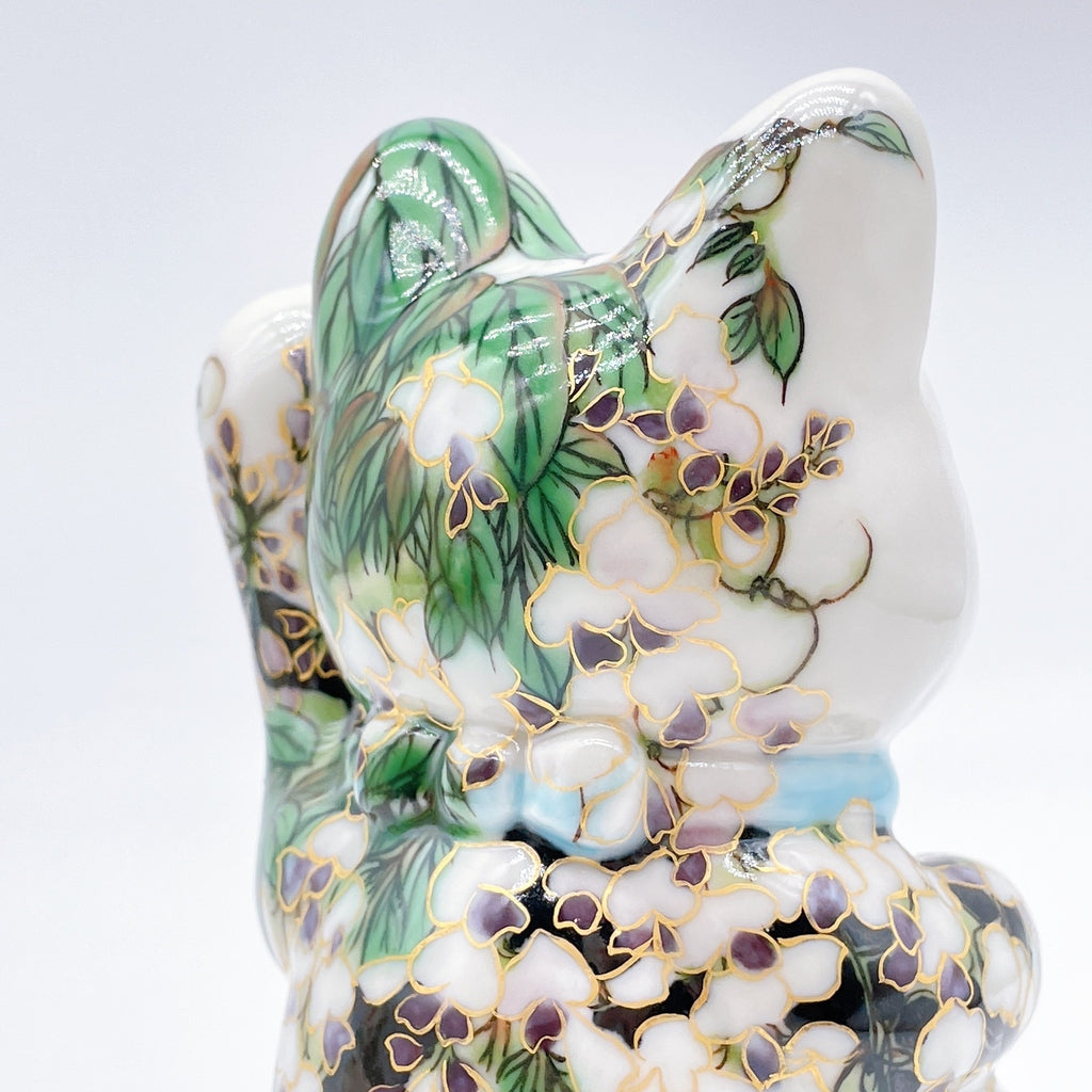 Japanese Kiyomizu-style lucky cat with black and white wisteria vines