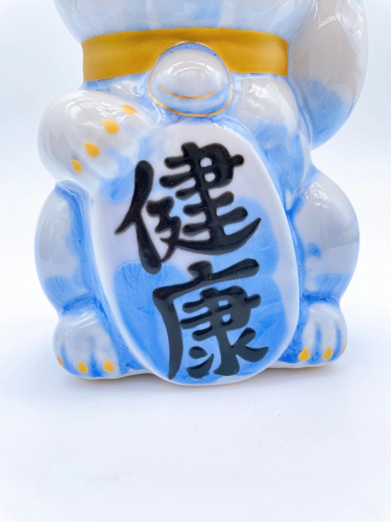Japanese Kiyomizu-yaki lucky cat flower crystals, white and blue.