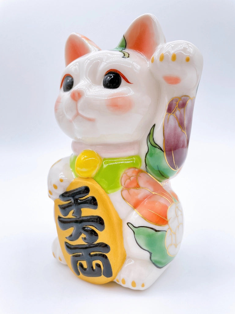 Japanese Kiyomizu-style lucky cat with white tulip background