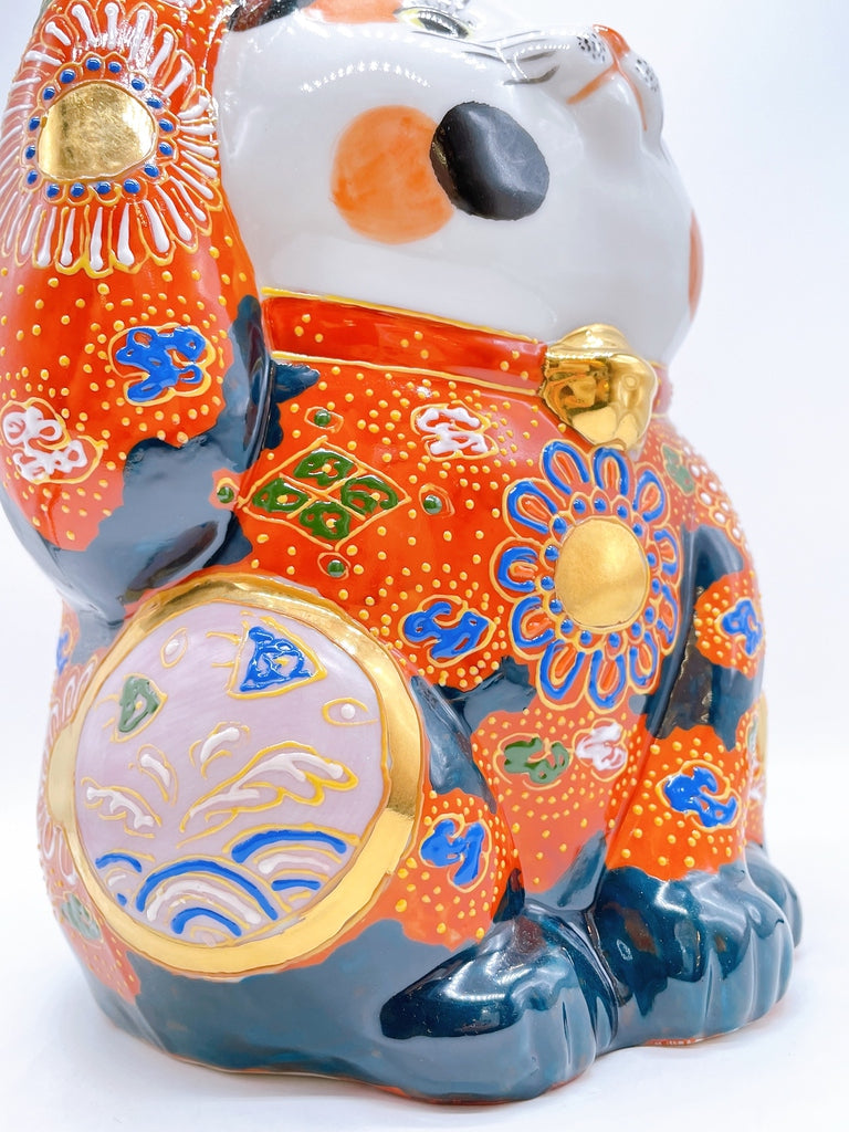 Japanese Kutani-style lucky cat with white hair
