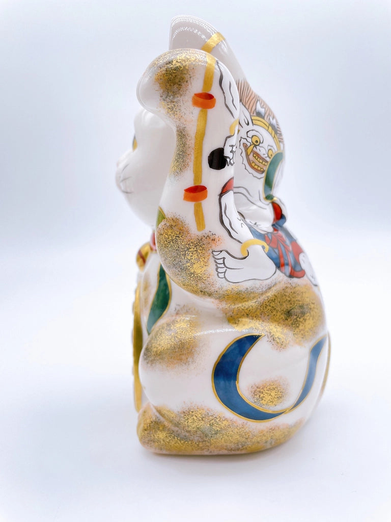 Japanese Kiyomizu-yaki lucky cat image with wind and thunder gods.