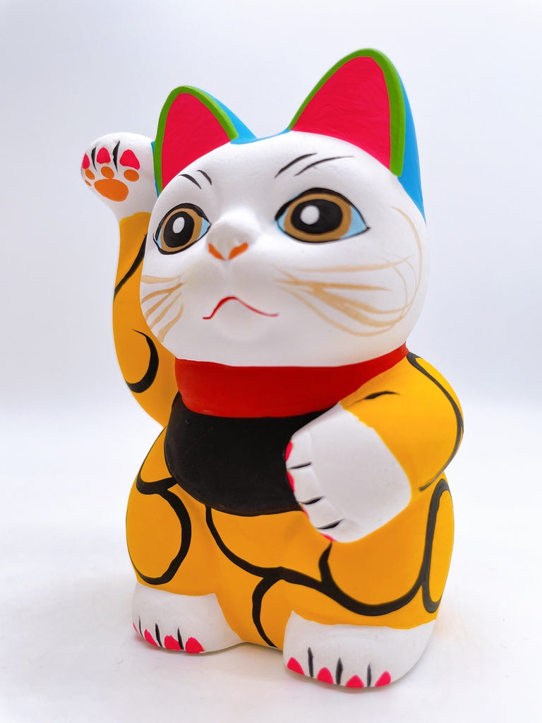 Japanese arabesque yellow lucky cat with a million taels of silver